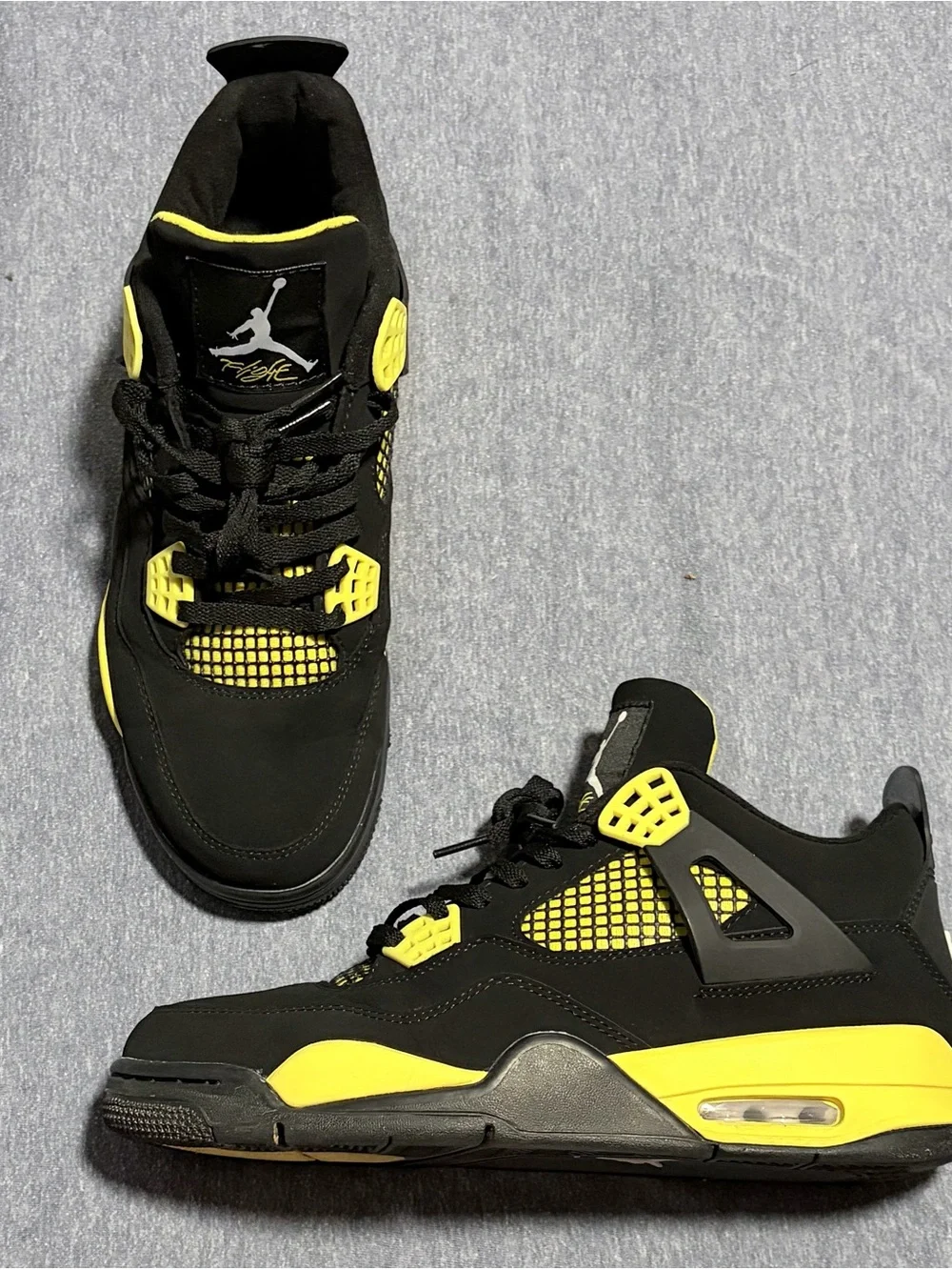 Jordan 4 Retro “Thunder” 2023 - Black/Yellow Retro Style